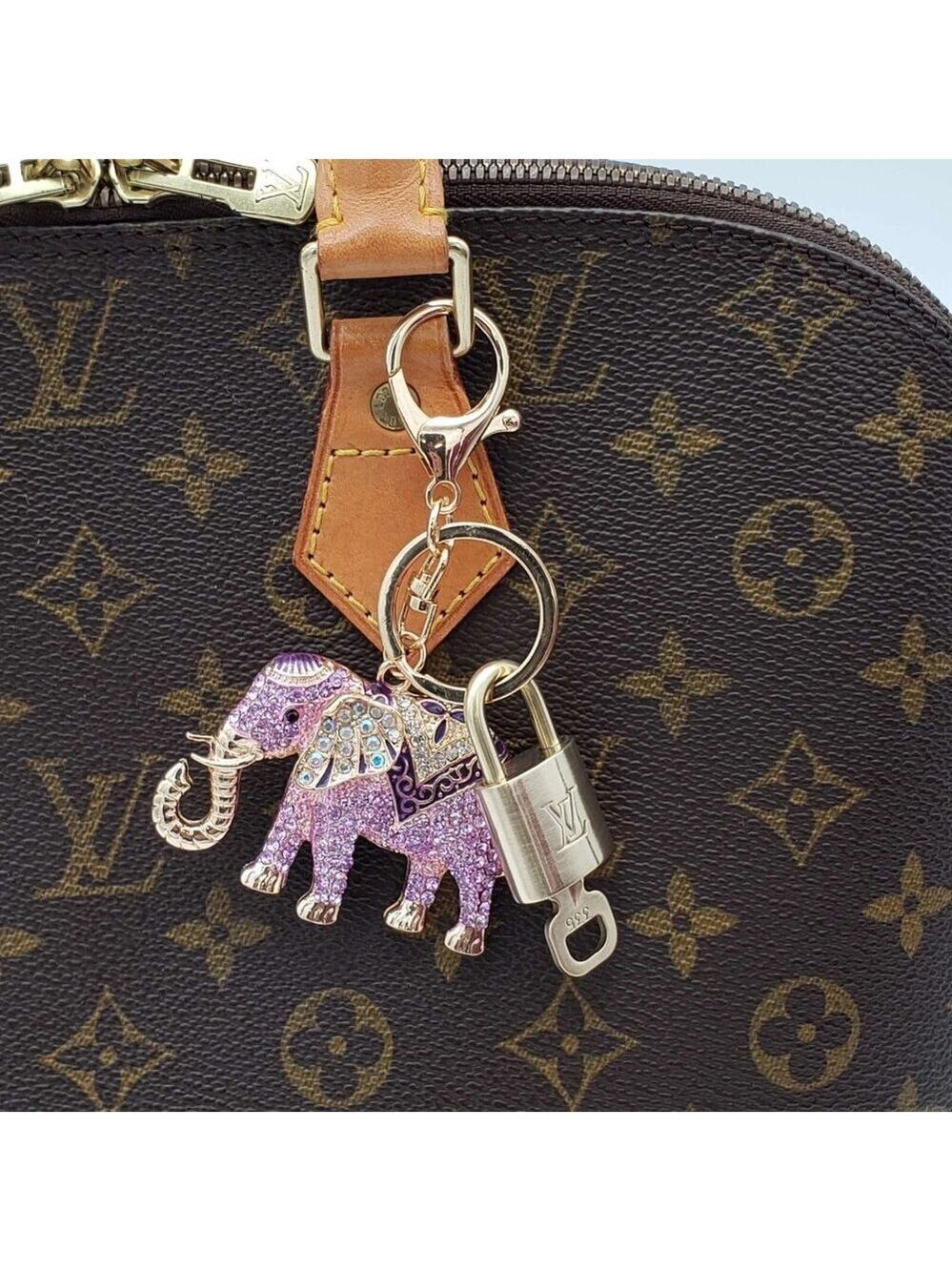 Authentic Louis Vuitton Lock & Key with unbranded Elephant Bagcharm, Keycharm